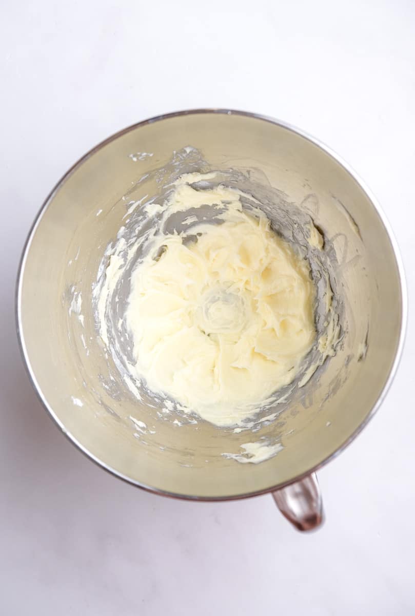 Image shows step 2 of how to make a red velvet mug cake.