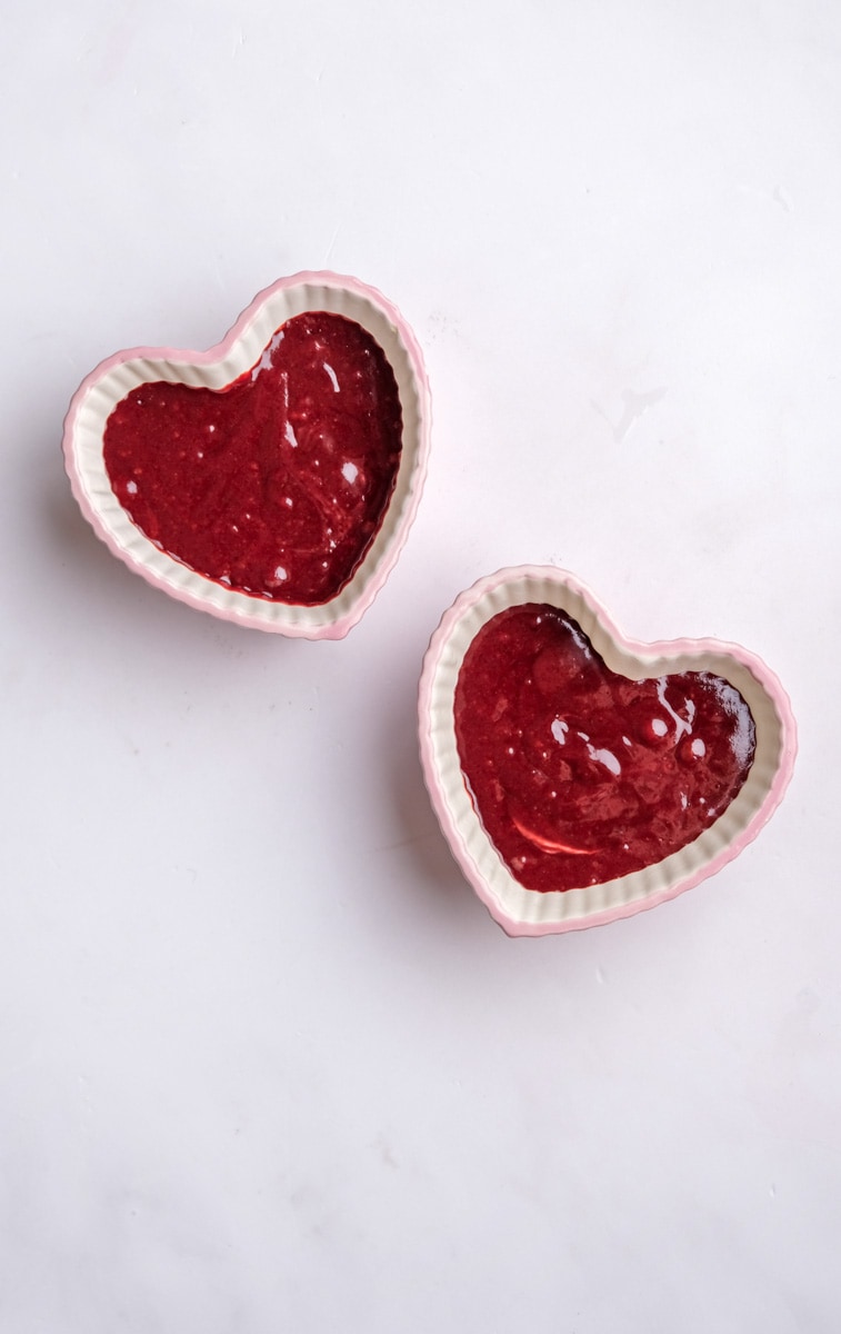 Image shows step 6 of how to make a red velvet mug cake.