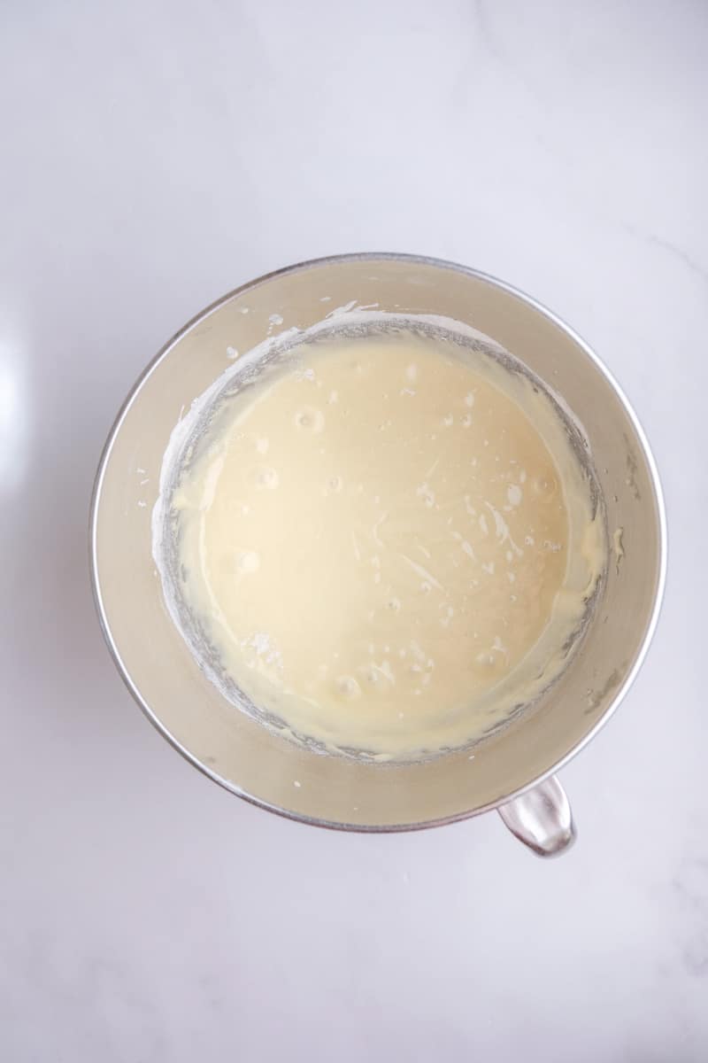 Image shows step 1 of how to make vanilla cupcakes with oil.