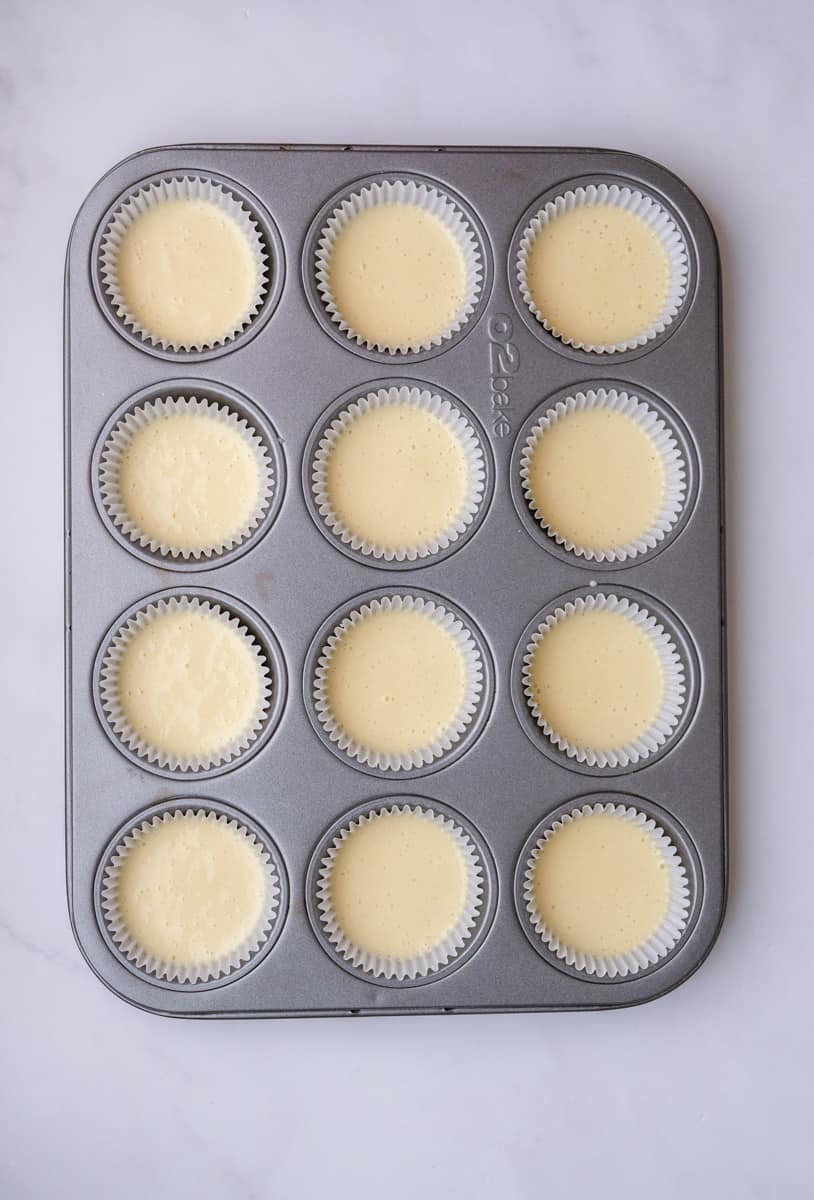 Image shows step 3 of how to make vanilla cupcakes with oil.
