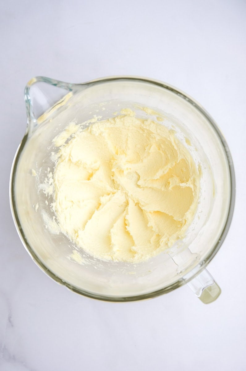 Image showing step 1 of how to make the raspberry white chocolate cupcakes.