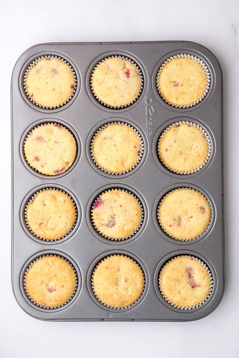 Image showing step 6 of how to make the raspberry white chocolate cupcakes.