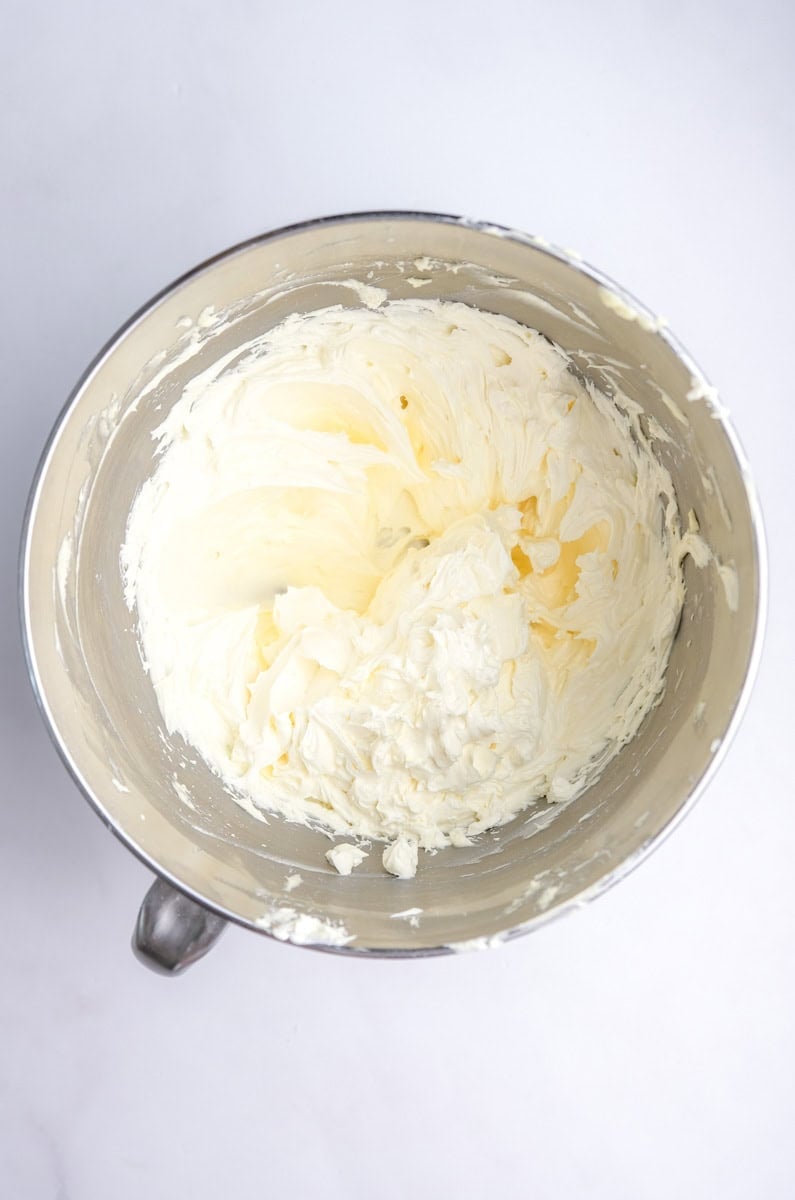 Image showing step 2 of how to make the white chocolate frosting.