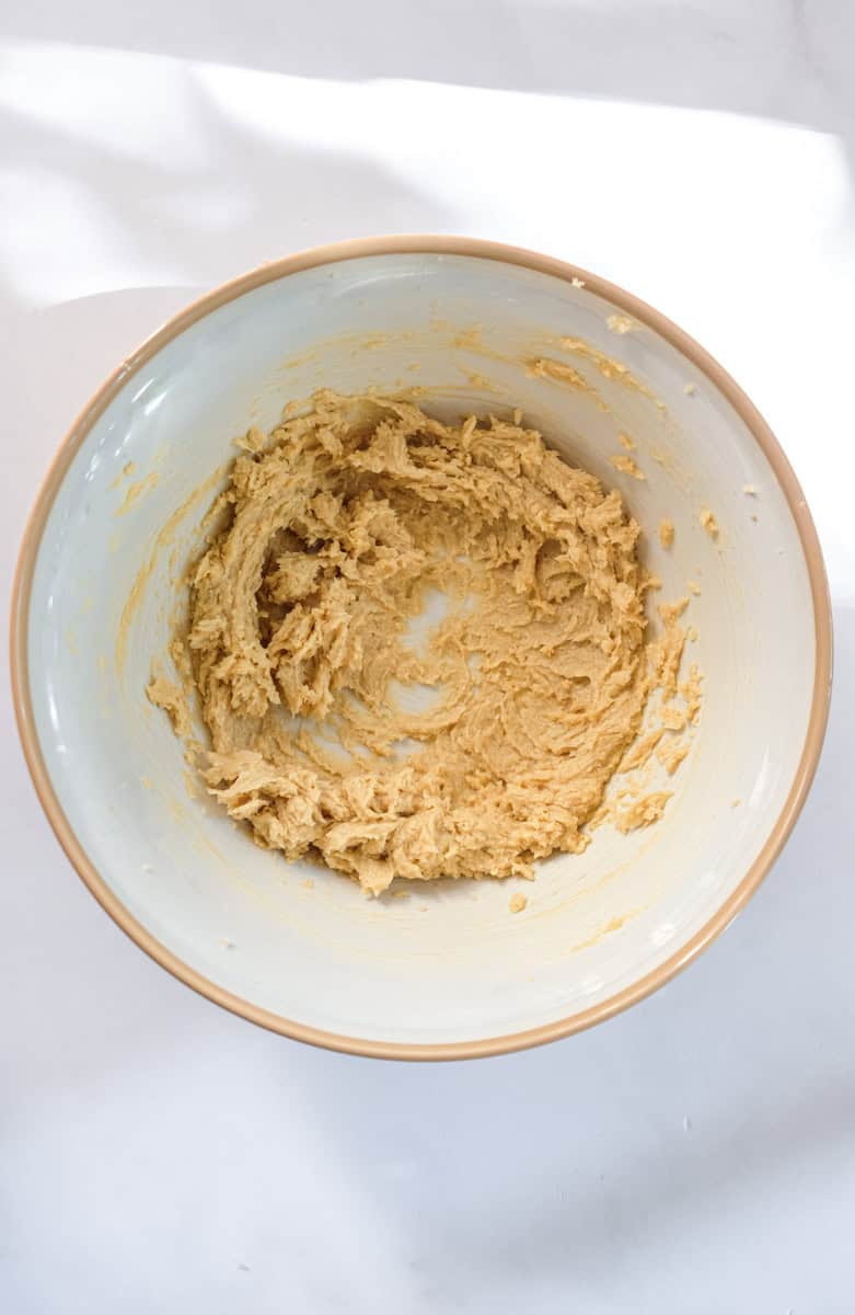 Image shows step 1 of how to make hazelnut chocolate cookies.