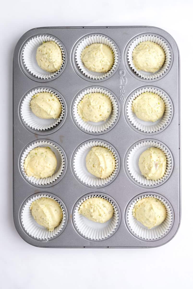 Image showing step 5 of how to make pistachio cupcakes.