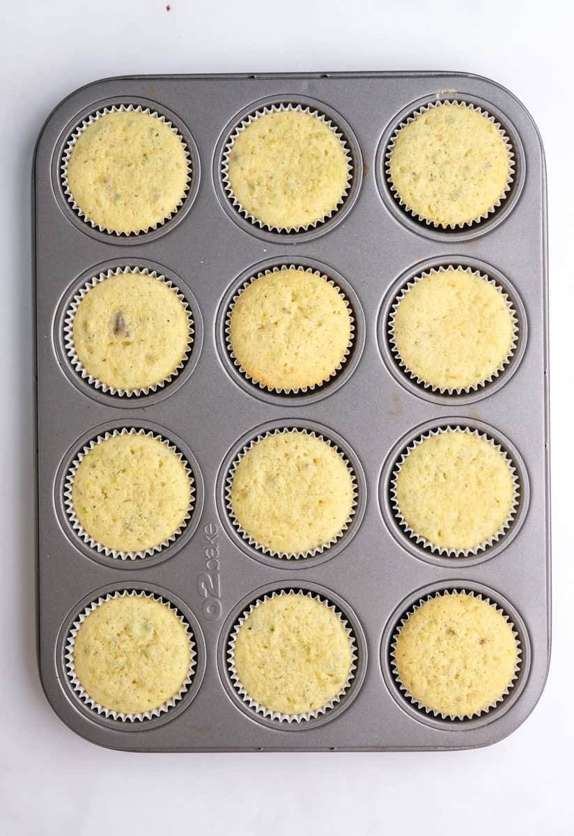 Image showing step 6 of how to make pistachio cupcakes.