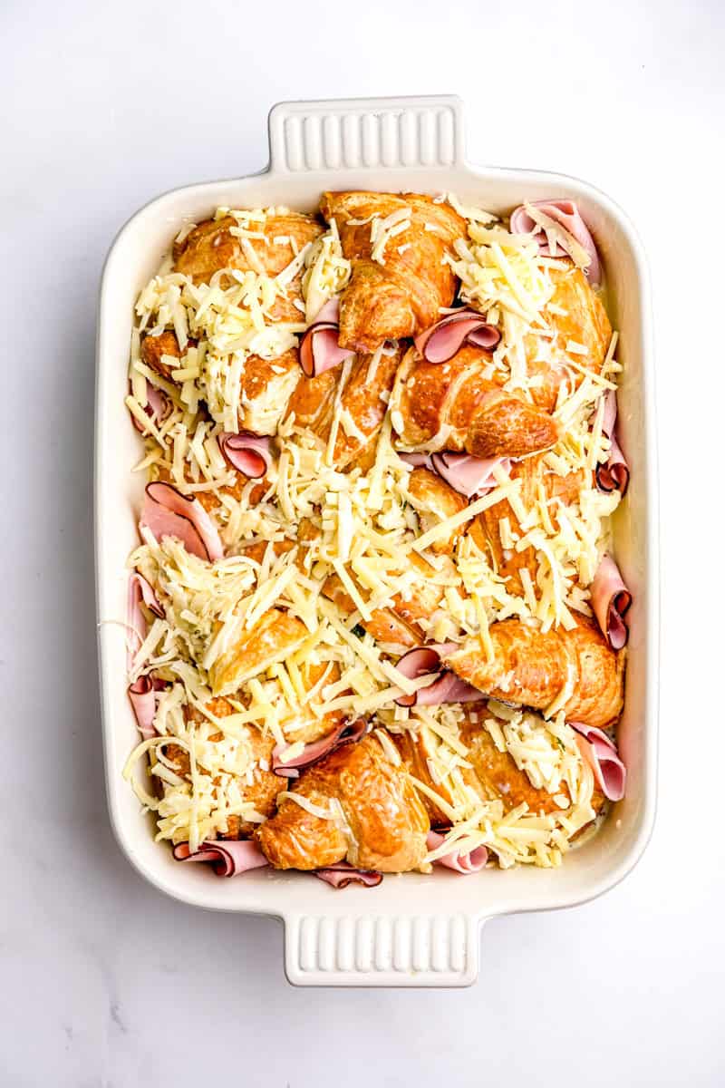 Image showing step 3 of how to make a ham and cheese croissant bake.