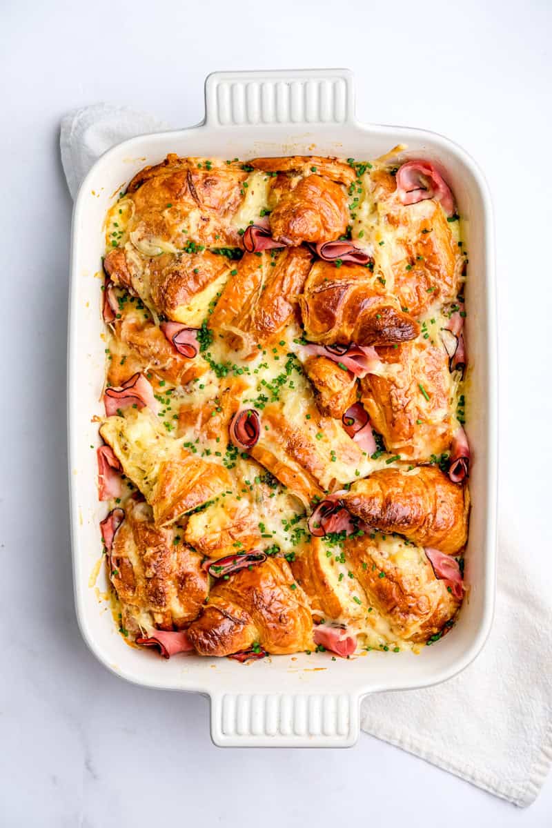 Image showing step 4 of how to make a ham and cheese croissant bake.