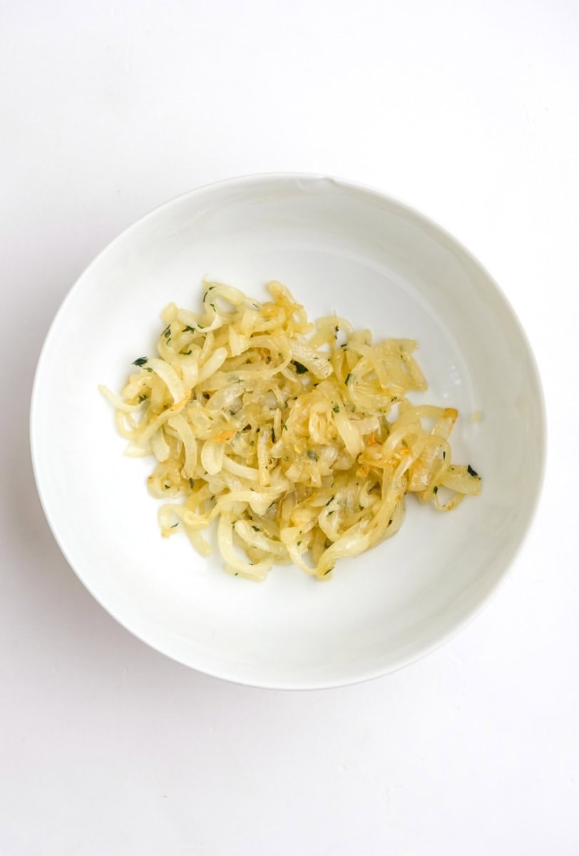 Image showing step 1 of how to make a ham and cheese croissant bake.