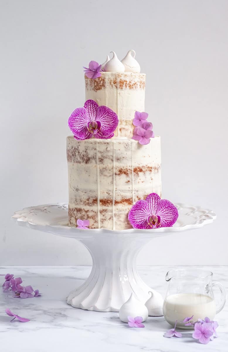 Mini Meringues shown decorating a two tier naked cake.