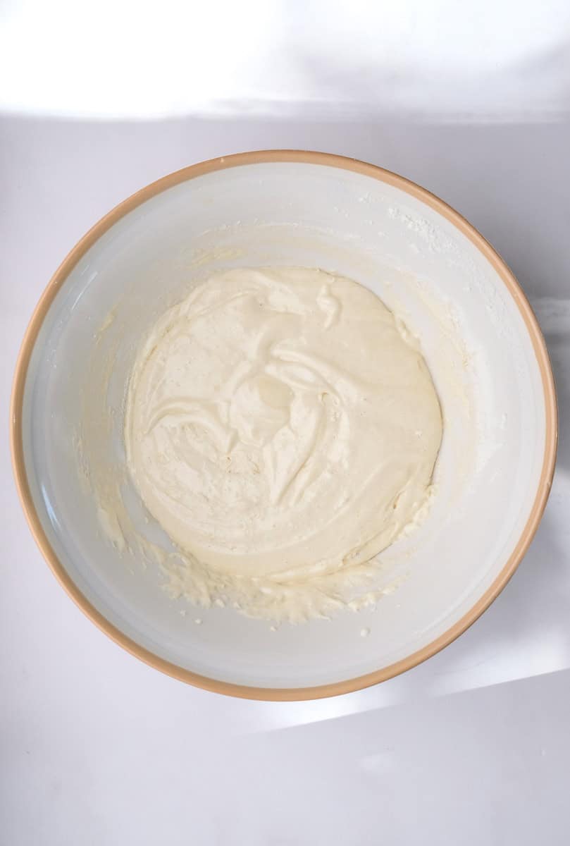 Image shows step 3 of how to make. a hot milk sponge cake.