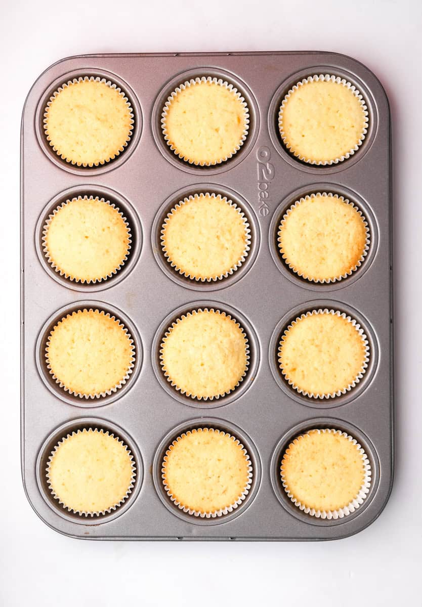 Image shows step 6 of how to make the orange cupcakes.