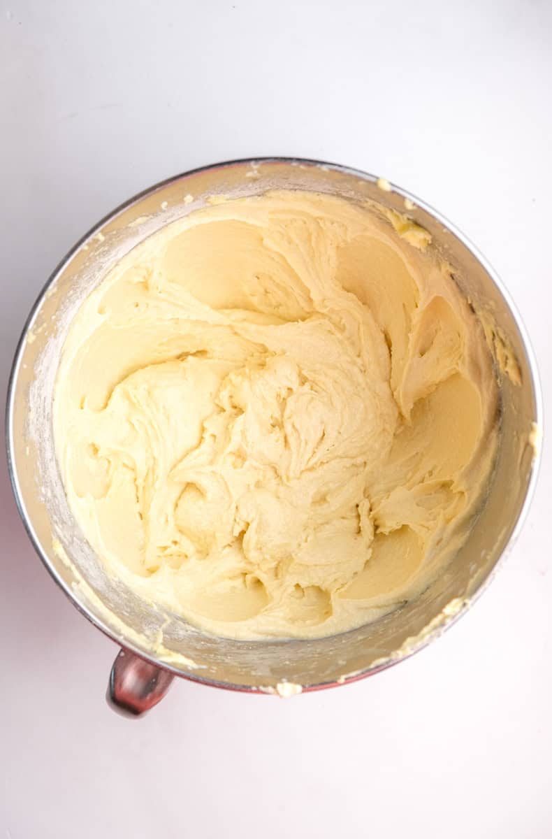 Image shows step 3 of how to make the orange cupcakes.