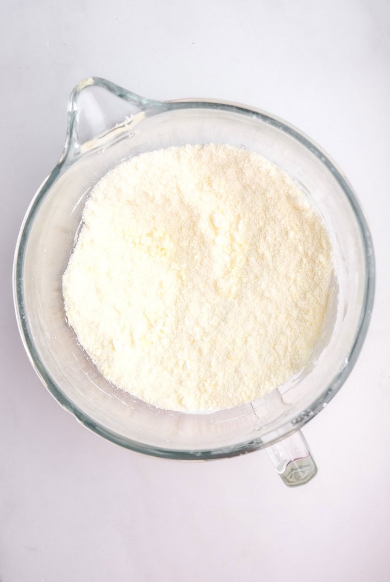 Image shows step 1 of how to make the orange frosting.