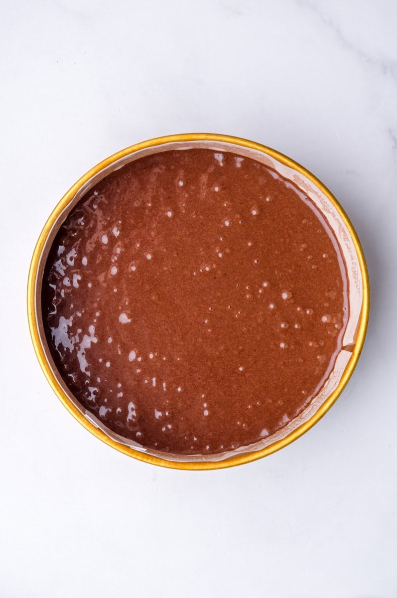 Image showing step 5 of how to make a chocolate cake.