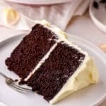 A slice of cake shown on a white plate