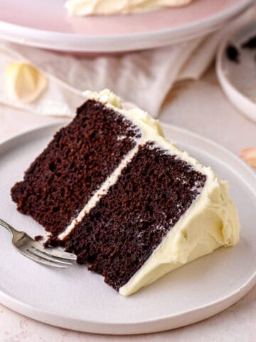 A slice of cake shown on a white plate