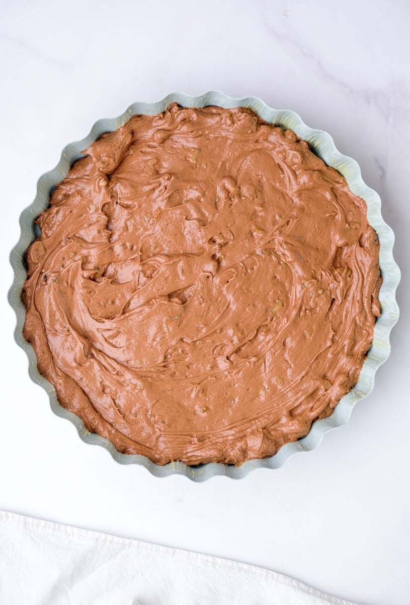 Image shows step 5 of how to make the walnut brownies.