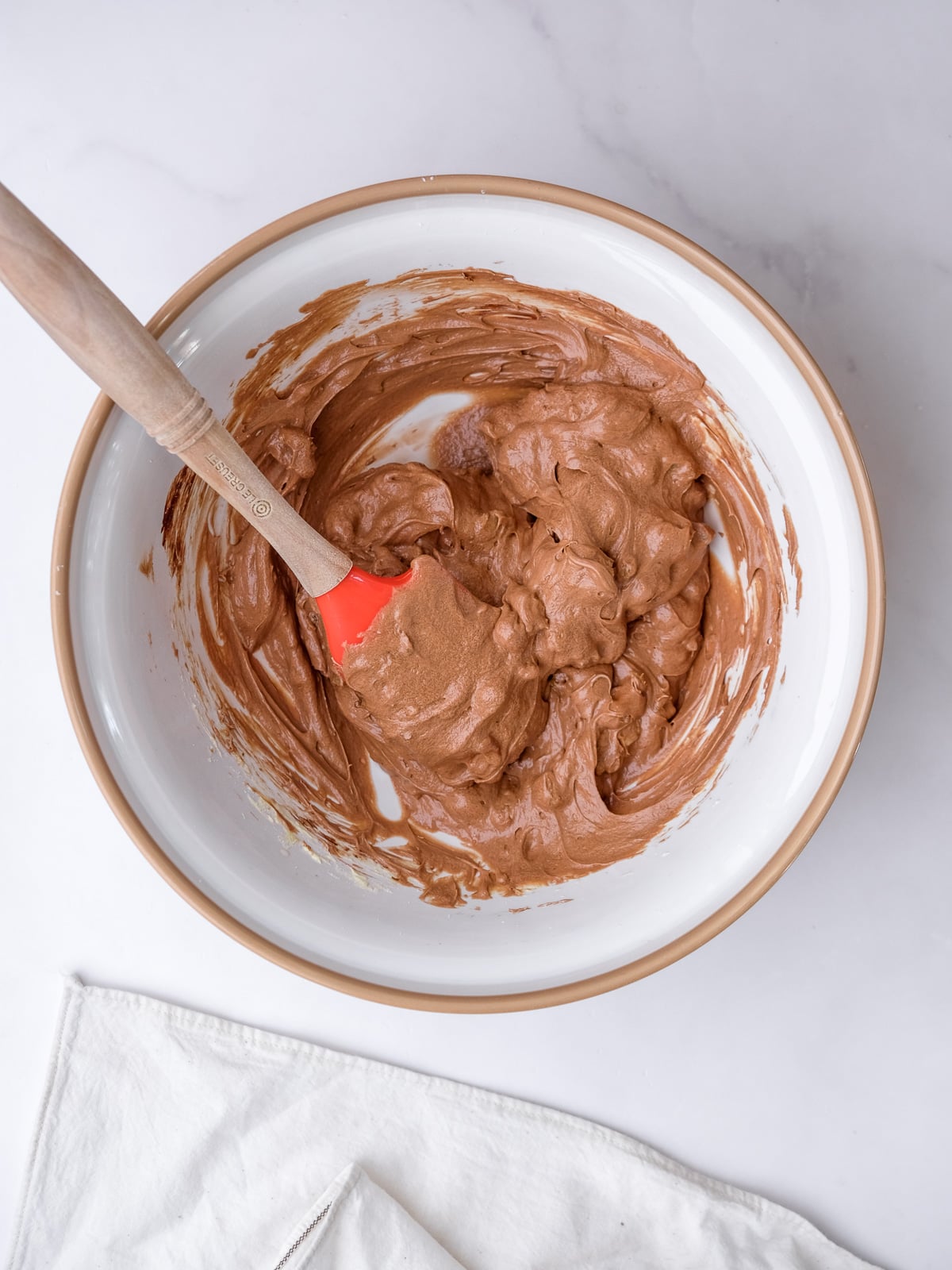 Image shows step 4 of how to make the walnut brownies.