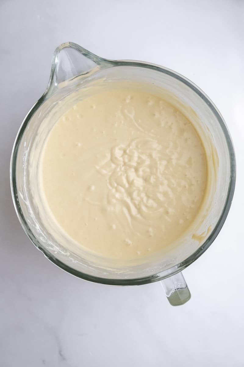 Image shows step 4 of how to make the vanilla cake.