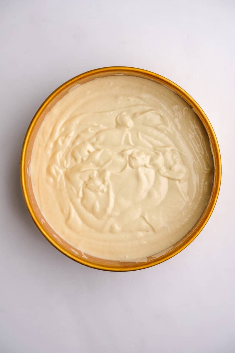 Image shows step 5 of how to make the vanilla cake.