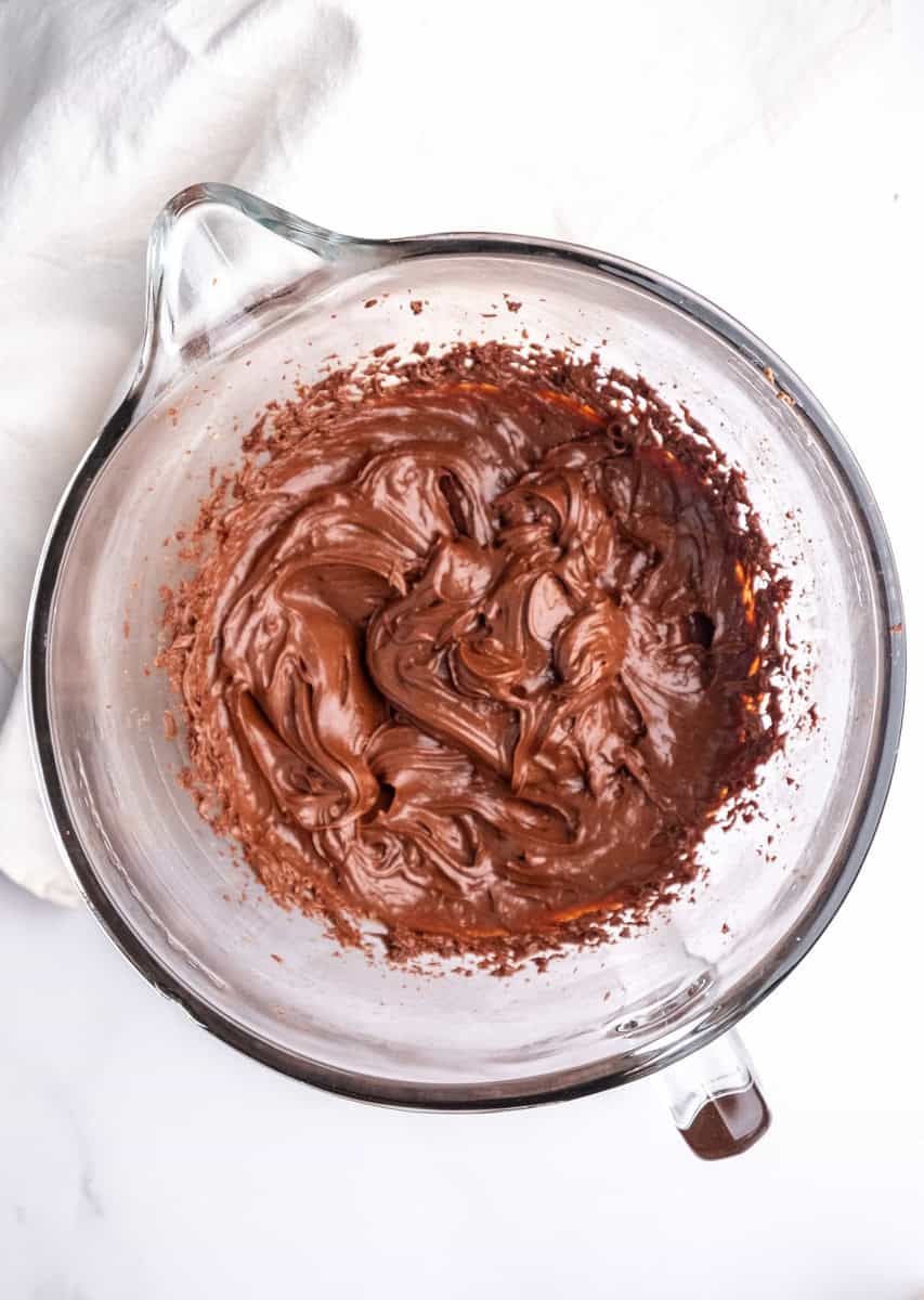 Image shows step 3 of how to make the chocolate frosting.