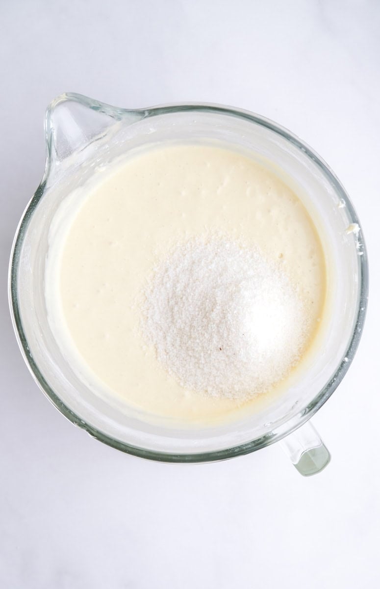 Image showing step 4 of how to make the vanilla coconut cake.