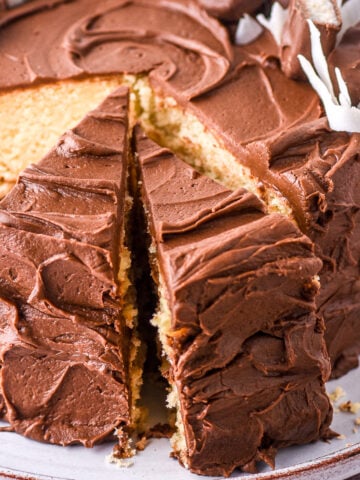 Bounty Cake shown shown with a few slices cut.
