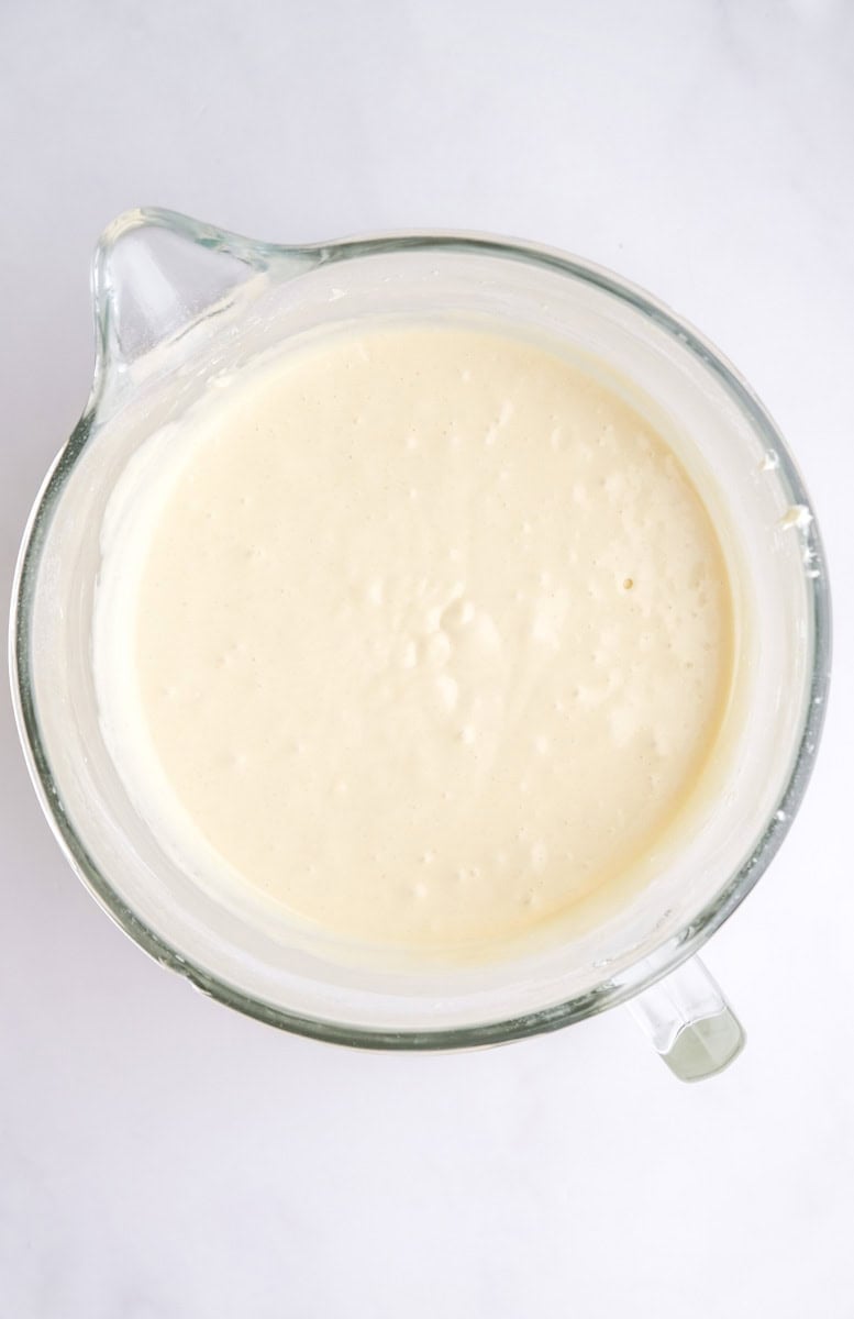 Image shows step 4 of how to make the vanilla cake.