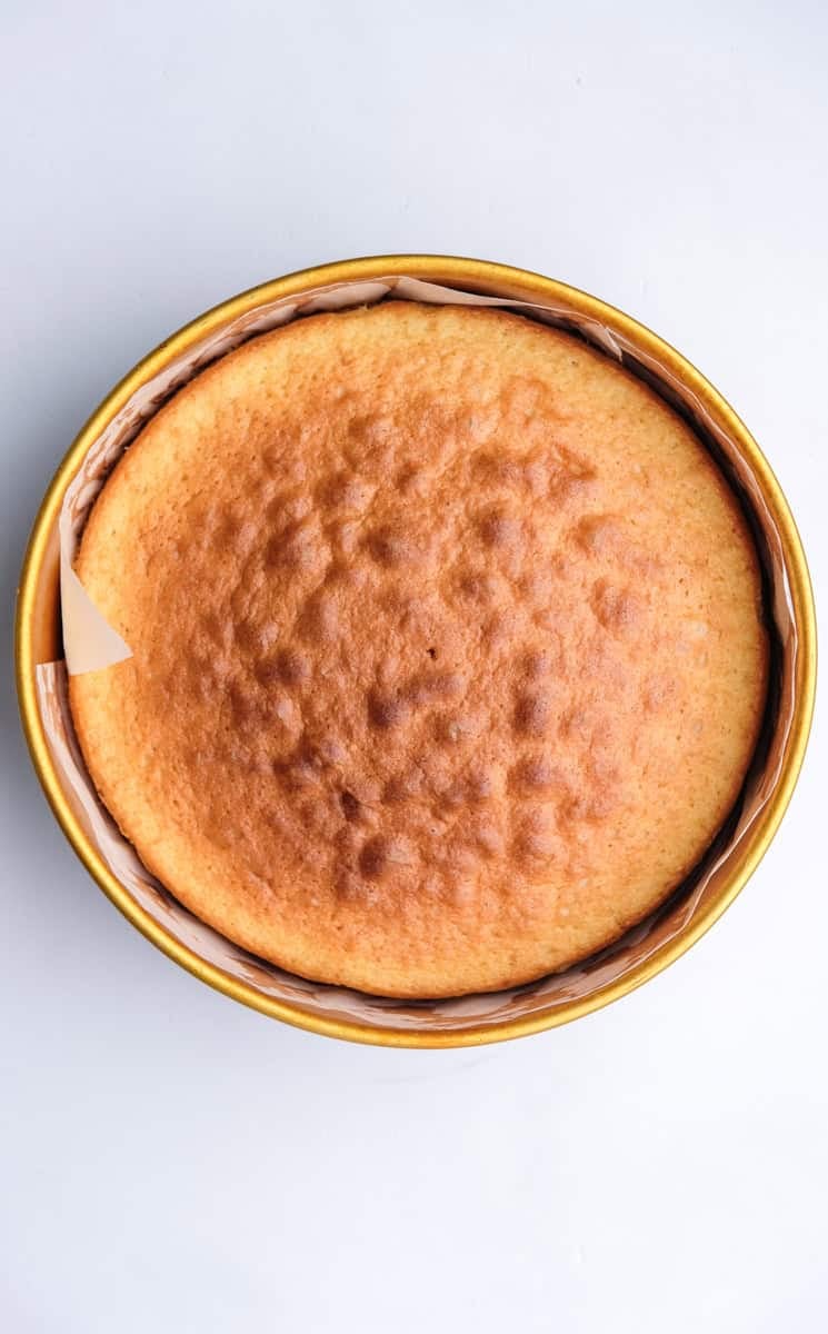 Image shows step 6 of how to make the vanilla cake.