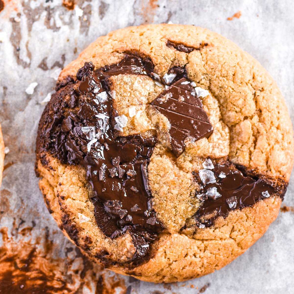 Bacon fat chocolate chip cookie shown from above,, you can see the melted chocolate.