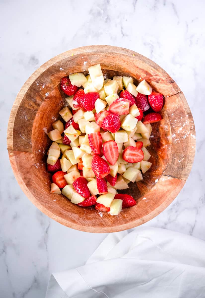 Image showing step 2 of how to make an Apple and Strawberry Crumble. 