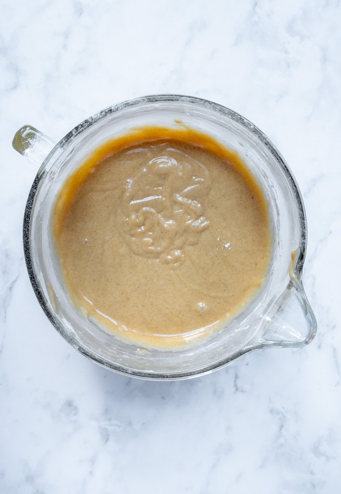 Image shows step 2 of how to make the carrot cake.