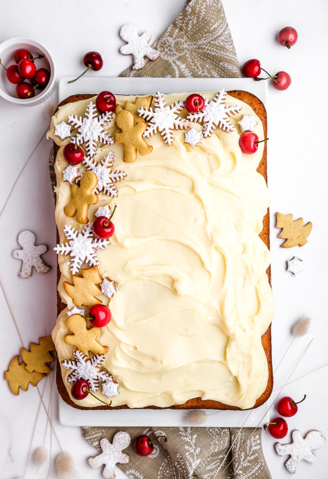 Image shows the final step of decorating the cake.