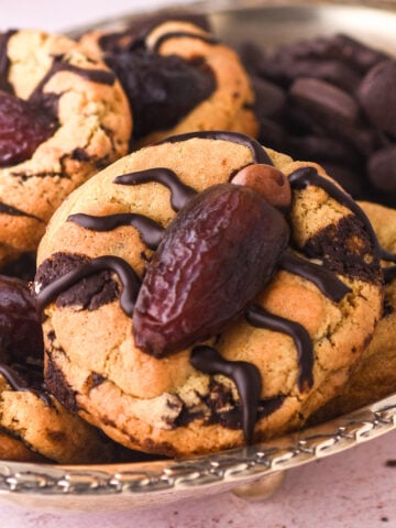 Halloween Cockroach Cookies shown in a silver basket.