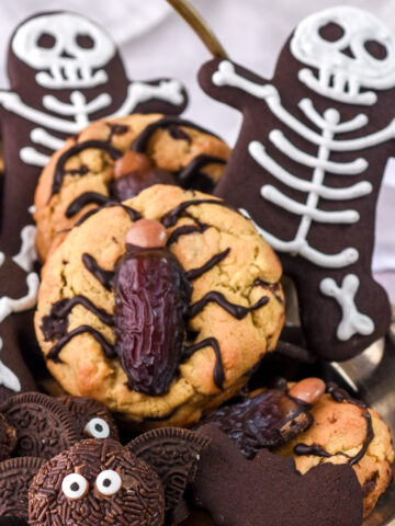 Easy Halloween Cookie Recipes shown in a basket.