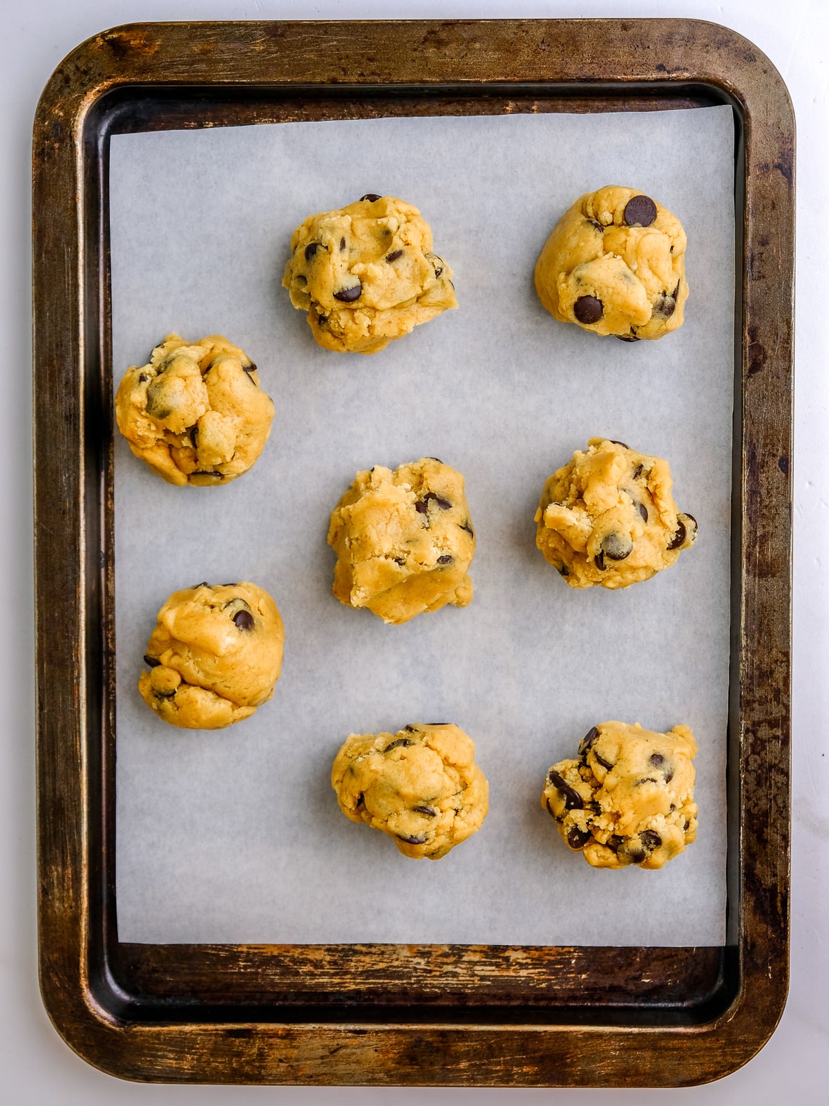 Image shows step 5 of how to make Halloween Cockroach Chocolate Chip Cookies.