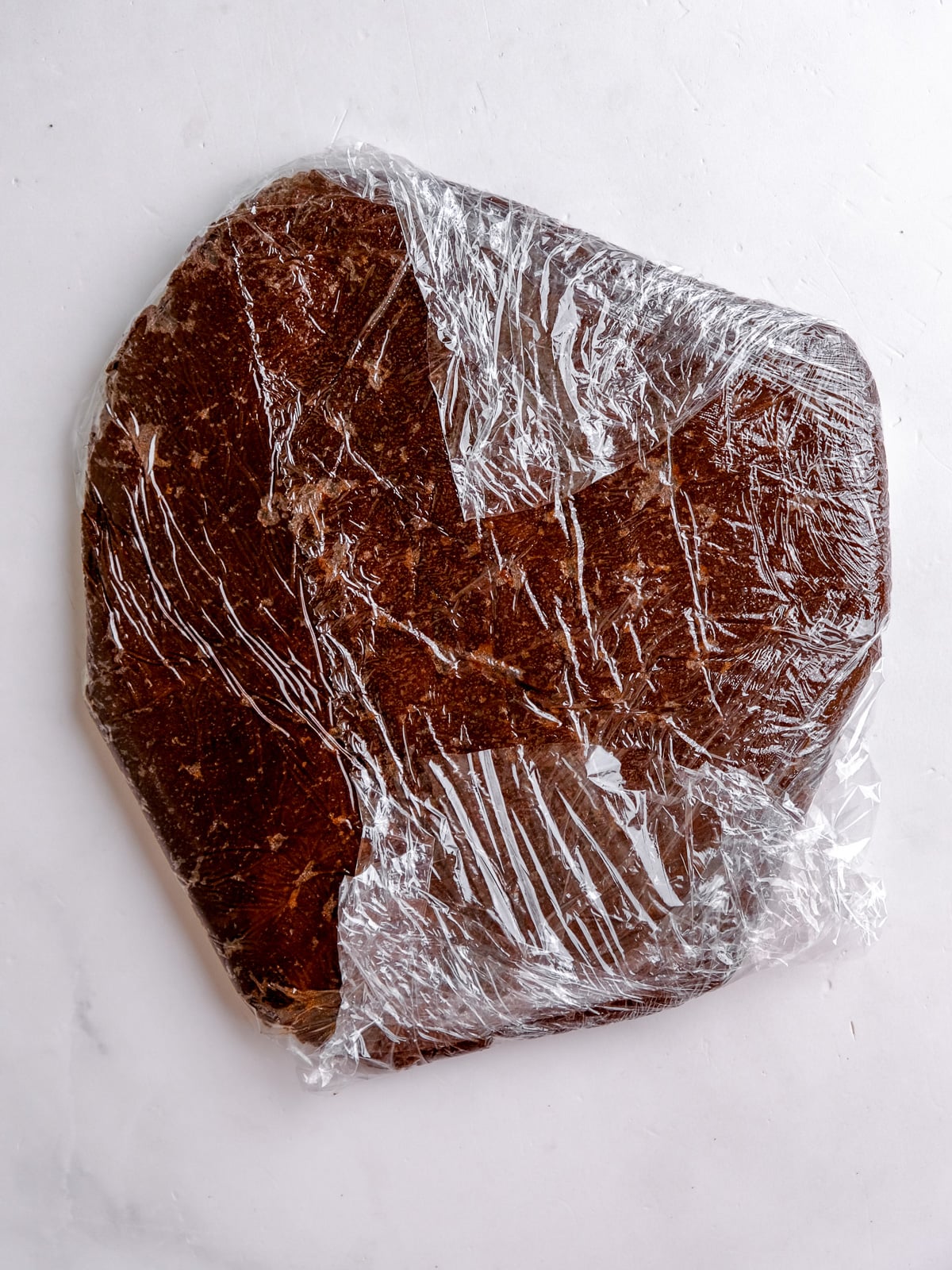 Image shows step 5 of how to make chocolate gingerbread cookies.