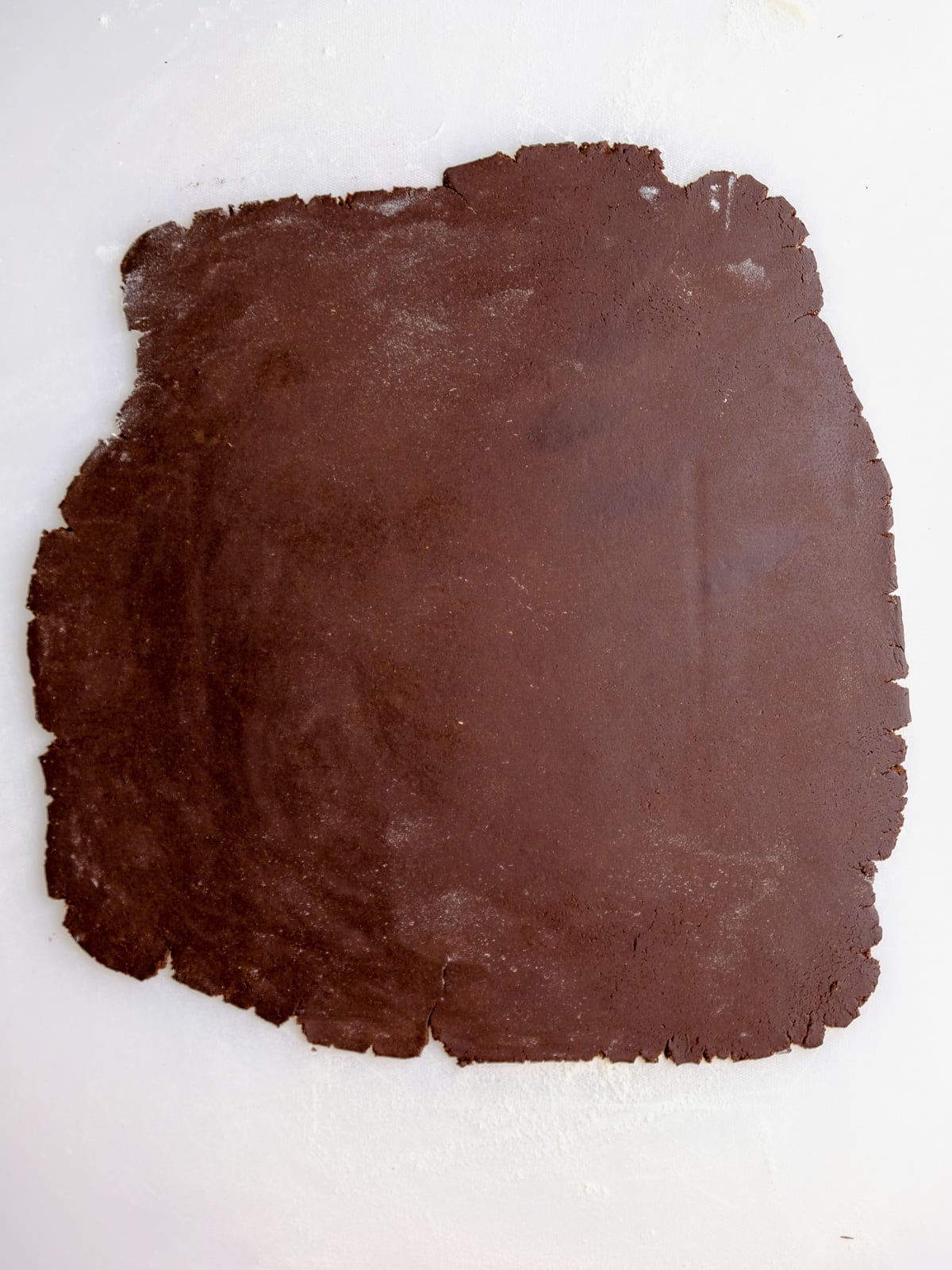 Image shows step 6 of how to make chocolate gingerbread cookies.